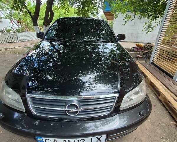 Черный Опель Омега, объемом двигателя 2.5 л и пробегом 300 тыс. км за 4000 $, фото 9 на Automoto.ua