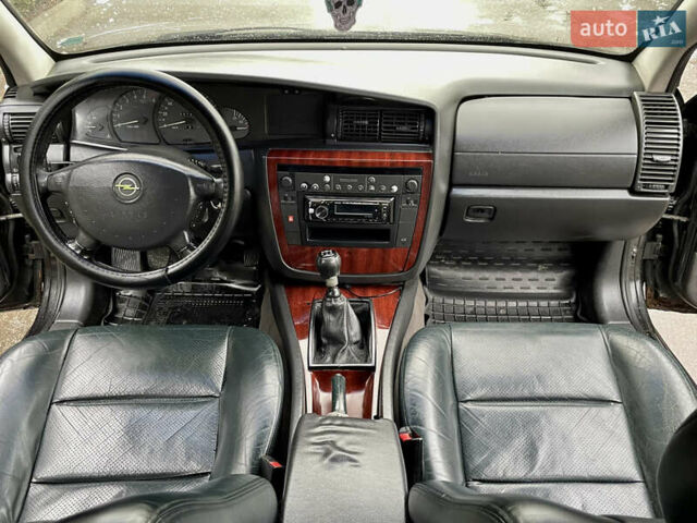 Черный Опель Омега, объемом двигателя 2.2 л и пробегом 290 тыс. км за 2350 $, фото 15 на Automoto.ua