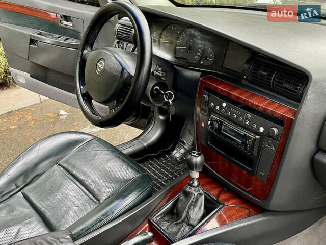 Черный Опель Омега, объемом двигателя 2.2 л и пробегом 290 тыс. км за 2350 $, фото 18 на Automoto.ua