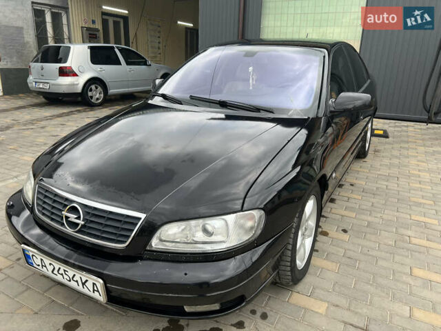 Черный Опель Омега, объемом двигателя 2.5 л и пробегом 280 тыс. км за 4300 $, фото 9 на Automoto.ua