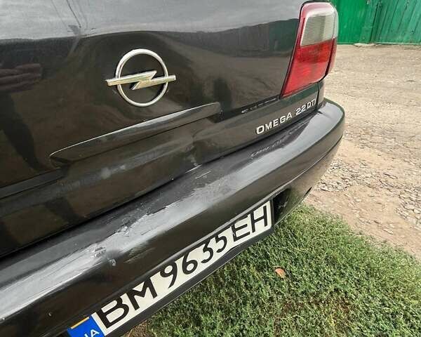 Черный Опель Омега, объемом двигателя 2.17 л и пробегом 330 тыс. км за 3300 $, фото 9 на Automoto.ua
