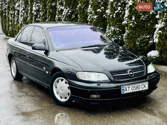 Черный Опель Омега, объемом двигателя 2.2 л и пробегом 290 тыс. км за 2350 $, фото 9 на Automoto.ua