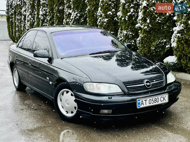 Черный Опель Омега, объемом двигателя 2.2 л и пробегом 290 тыс. км за 2350 $, фото 28 на Automoto.ua