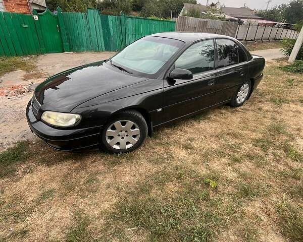 Черный Опель Омега, объемом двигателя 2.17 л и пробегом 330 тыс. км за 3300 $, фото 8 на Automoto.ua