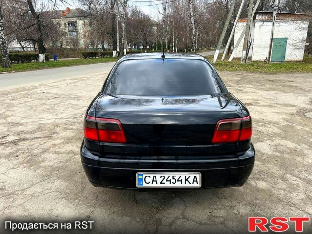 Черный Опель Омега, объемом двигателя 2.5 л и пробегом 280 тыс. км за 4500 $, фото 8 на Automoto.ua