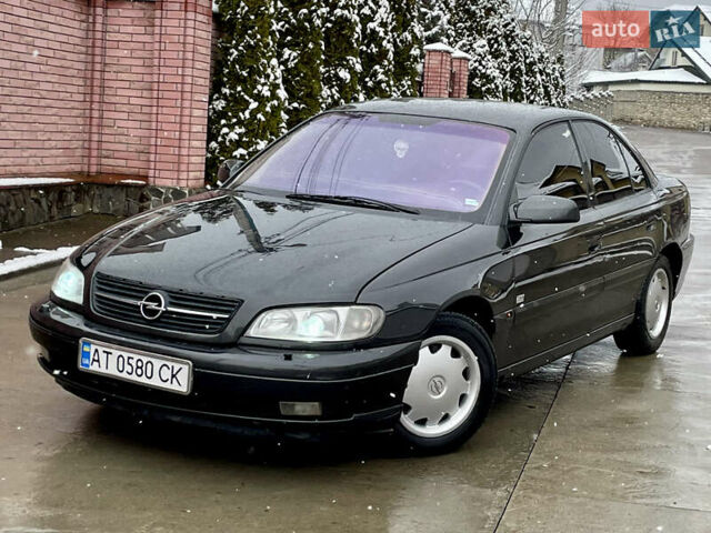 Черный Опель Омега, объемом двигателя 2.2 л и пробегом 290 тыс. км за 2350 $, фото 21 на Automoto.ua
