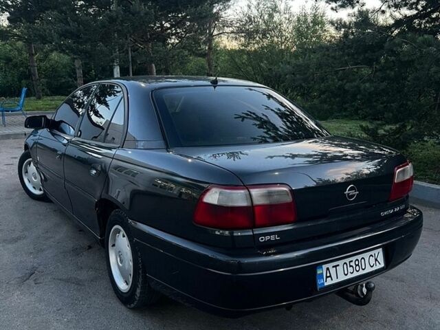 Чорний Опель Омега, об'ємом двигуна 2.17 л та пробігом 350 тис. км за 3100 $, фото 5 на Automoto.ua