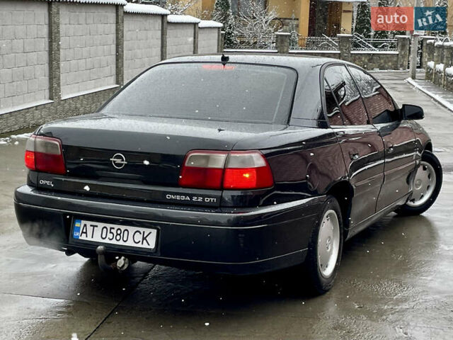 Черный Опель Омега, объемом двигателя 2.2 л и пробегом 290 тыс. км за 2350 $, фото 23 на Automoto.ua