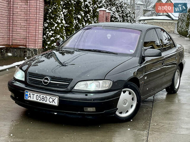 Черный Опель Омега, объемом двигателя 2.2 л и пробегом 290 тыс. км за 2350 $, фото 2 на Automoto.ua