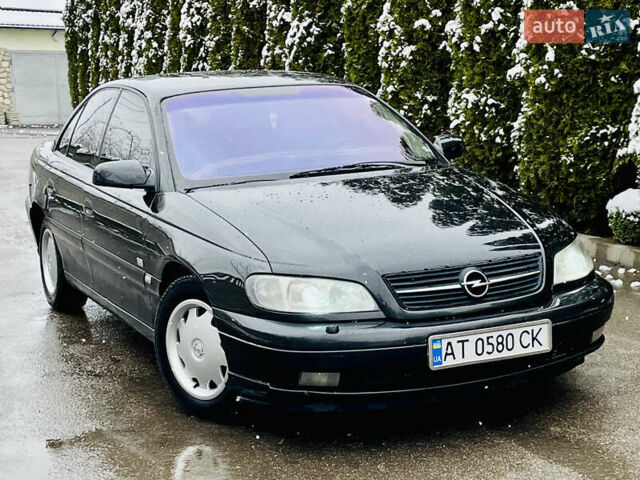 Черный Опель Омега, объемом двигателя 2.2 л и пробегом 290 тыс. км за 2350 $, фото 1 на Automoto.ua