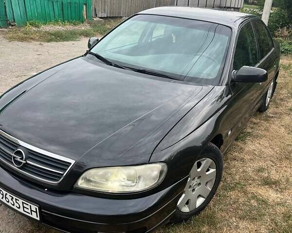 Черный Опель Омега, объемом двигателя 2.17 л и пробегом 330 тыс. км за 3300 $, фото 1 на Automoto.ua