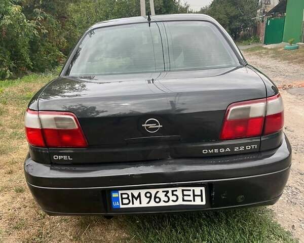 Черный Опель Омега, объемом двигателя 2.17 л и пробегом 330 тыс. км за 3300 $, фото 5 на Automoto.ua