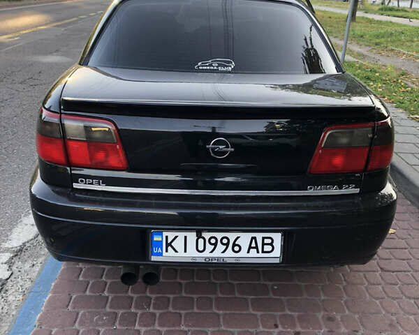 Чорний Опель Омега, об'ємом двигуна 2.2 л та пробігом 335 тис. км за 4000 $, фото 41 на Automoto.ua