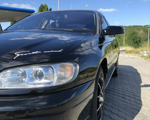 Чорний Опель Омега, об'ємом двигуна 2.2 л та пробігом 467 тис. км за 4000 $, фото 6 на Automoto.ua