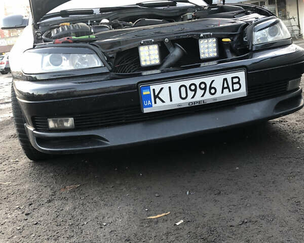 Чорний Опель Омега, об'ємом двигуна 2.2 л та пробігом 335 тис. км за 4000 $, фото 29 на Automoto.ua