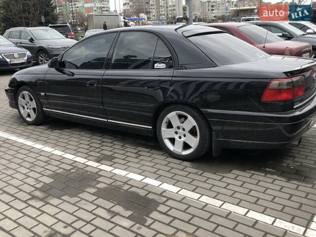 Чорний Опель Омега, об'ємом двигуна 2.2 л та пробігом 335 тис. км за 4000 $, фото 12 на Automoto.ua