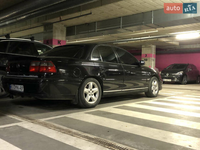 Чорний Опель Омега, об'ємом двигуна 2.2 л та пробігом 335 тис. км за 4000 $, фото 19 на Automoto.ua