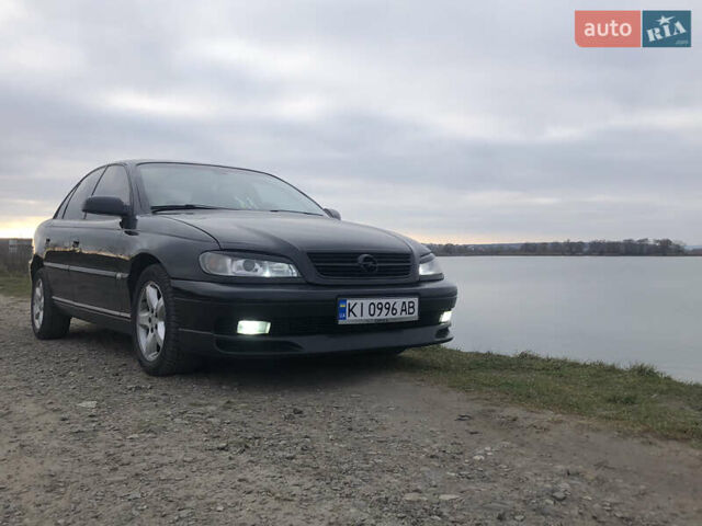 Чорний Опель Омега, об'ємом двигуна 2.2 л та пробігом 335 тис. км за 4000 $, фото 31 на Automoto.ua