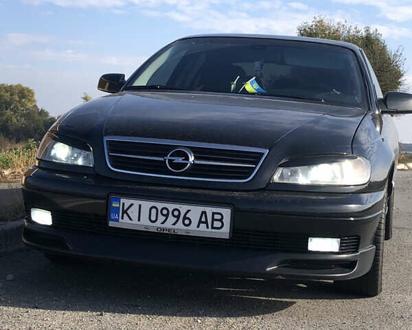 Чорний Опель Омега, об'ємом двигуна 2.2 л та пробігом 335 тис. км за 4000 $, фото 35 на Automoto.ua