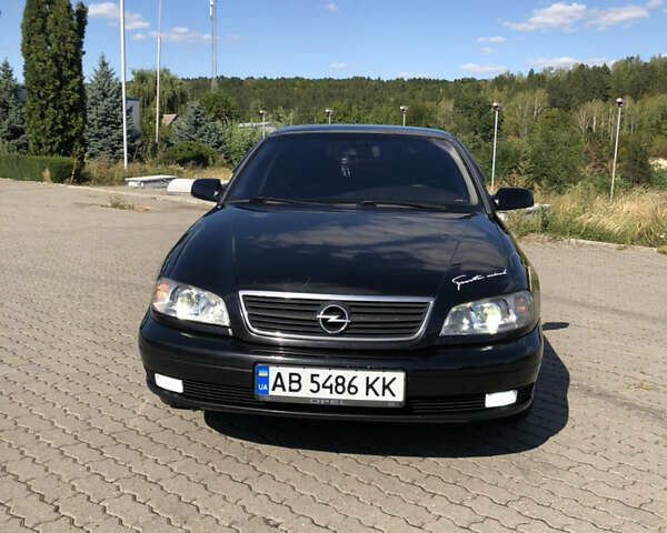 Чорний Опель Омега, об'ємом двигуна 2.2 л та пробігом 467 тис. км за 4000 $, фото 24 на Automoto.ua
