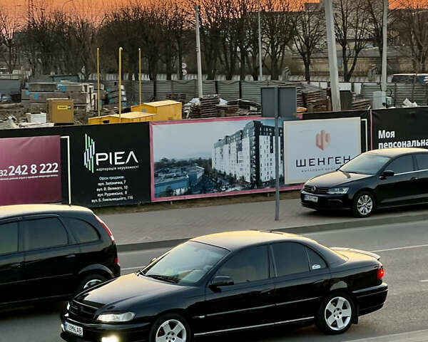 Чорний Опель Омега, об'ємом двигуна 2.2 л та пробігом 335 тис. км за 4000 $, фото 4 на Automoto.ua