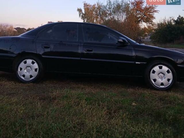 Опель Омега 2003 в Черкассах на Automoto.ua Черный Опель Омега, объемом двигателя 2.17 л и пробегом 273 тыс. км за 4200 $, фото 8 на Automoto.ua