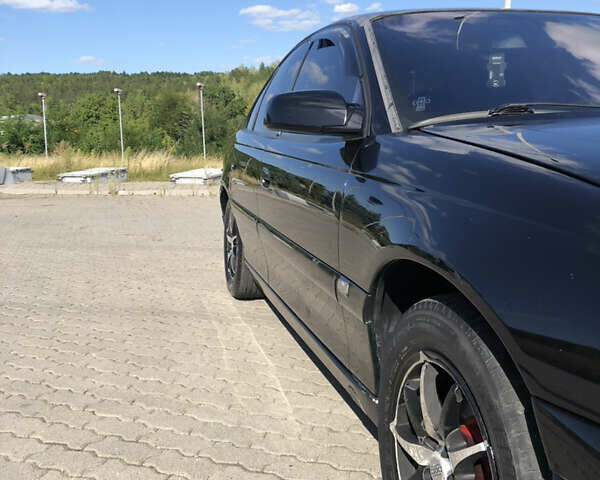 Чорний Опель Омега, об'ємом двигуна 2.2 л та пробігом 467 тис. км за 4000 $, фото 4 на Automoto.ua