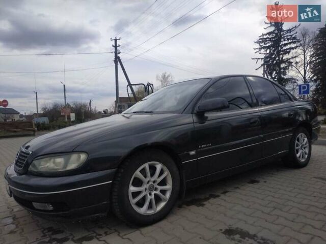 Черный Опель Омега, объемом двигателя 2.6 л и пробегом 300 тыс. км за 3100 $, фото 3 на Automoto.ua