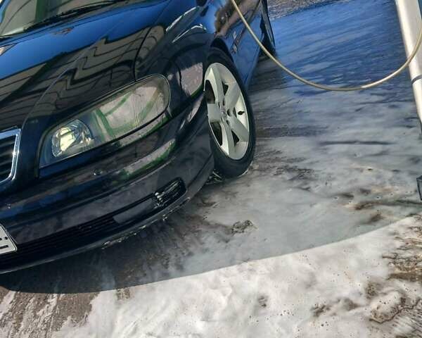 Черный Опель Омега, объемом двигателя 2.5 л и пробегом 215 тыс. км за 3000 $, фото 3 на Automoto.ua