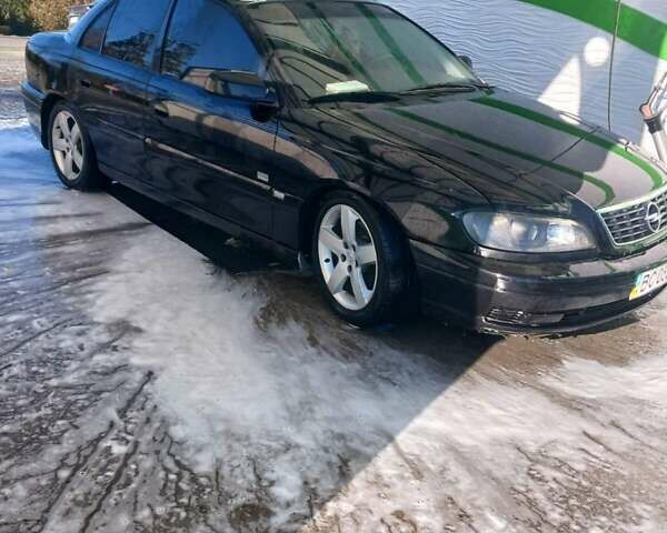 Черный Опель Омега, объемом двигателя 2.5 л и пробегом 215 тыс. км за 3000 $, фото 4 на Automoto.ua