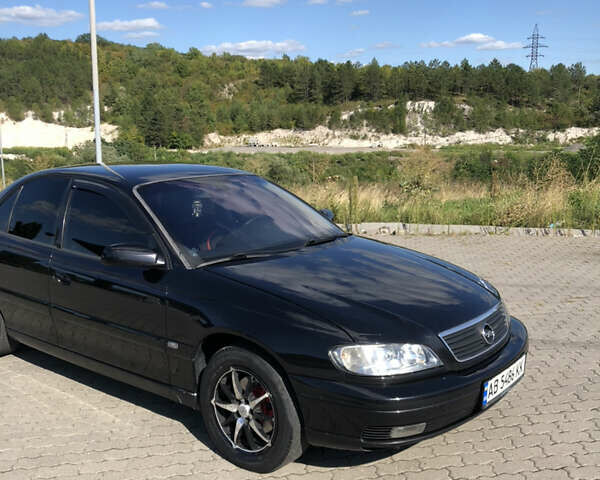 Чорний Опель Омега, об'ємом двигуна 2.2 л та пробігом 467 тис. км за 4000 $, фото 25 на Automoto.ua