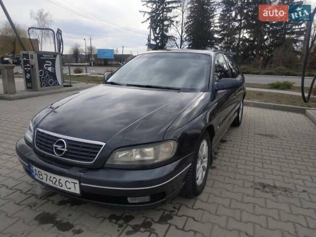 Черный Опель Омега, объемом двигателя 2.6 л и пробегом 300 тыс. км за 3100 $, фото 2 на Automoto.ua