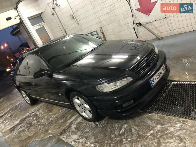 Чорний Опель Омега, об'ємом двигуна 2.2 л та пробігом 335 тис. км за 4000 $, фото 28 на Automoto.ua