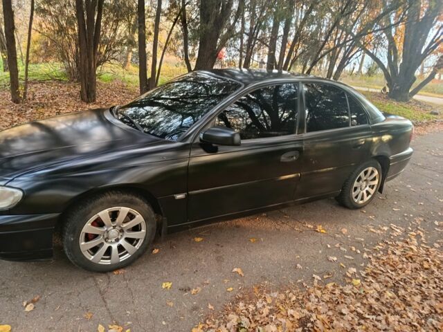 Черный Опель Омега, объемом двигателя 2.6 л и пробегом 350 тыс. км за 3700 $, фото 2 на Automoto.ua