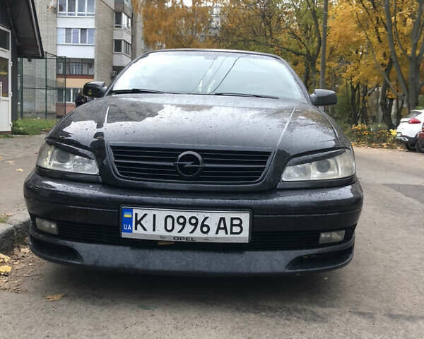 Чорний Опель Омега, об'ємом двигуна 2.2 л та пробігом 335 тис. км за 4000 $, фото 34 на Automoto.ua