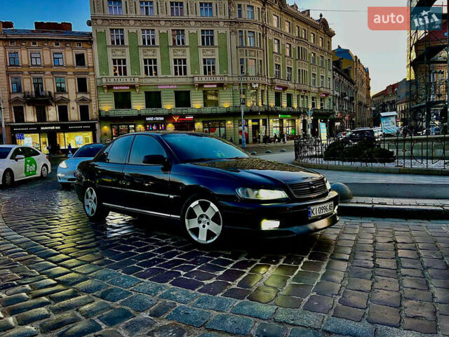 Чорний Опель Омега, об'ємом двигуна 2.2 л та пробігом 335 тис. км за 4000 $, фото 10 на Automoto.ua