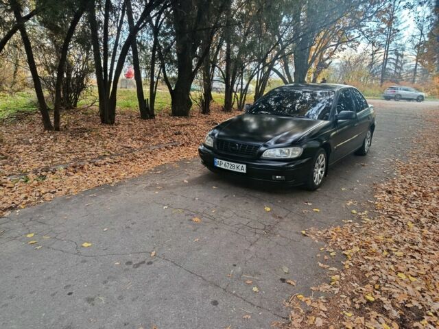 Черный Опель Омега, объемом двигателя 2.6 л и пробегом 350 тыс. км за 3700 $, фото 9 на Automoto.ua