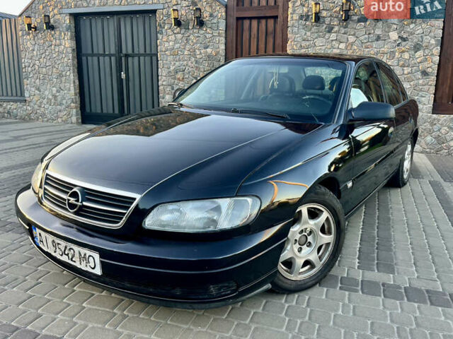 Чорний Опель Омега, об'ємом двигуна 2.2 л та пробігом 312 тис. км за 2999 $, фото 13 на Automoto.ua