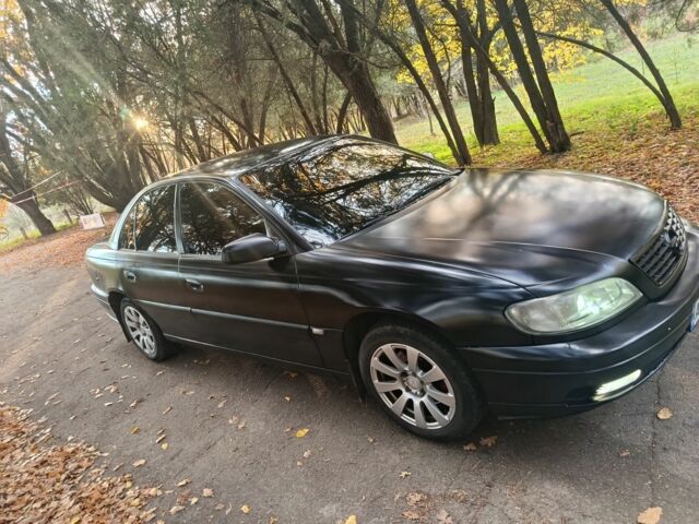 Черный Опель Омега, объемом двигателя 2.6 л и пробегом 350 тыс. км за 3700 $, фото 8 на Automoto.ua