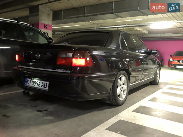 Чорний Опель Омега, об'ємом двигуна 2.2 л та пробігом 335 тис. км за 4000 $, фото 15 на Automoto.ua