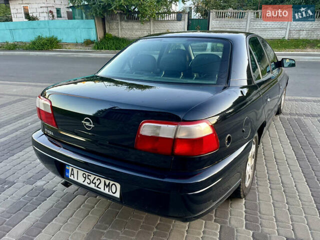 Чорний Опель Омега, об'ємом двигуна 2.2 л та пробігом 312 тис. км за 2999 $, фото 31 на Automoto.ua