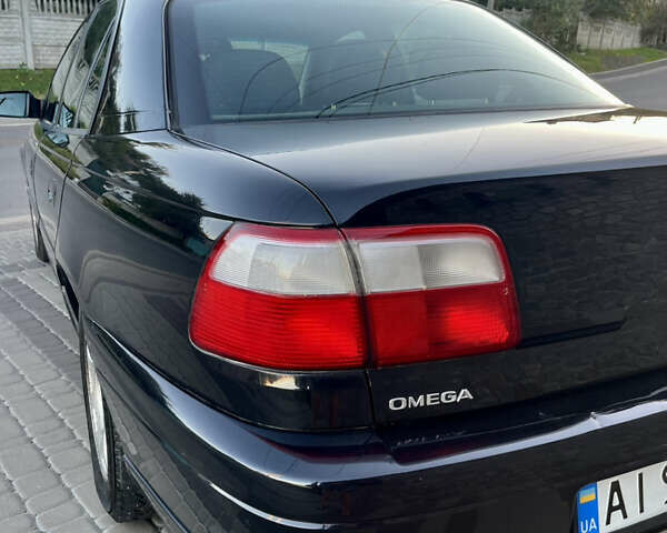 Чорний Опель Омега, об'ємом двигуна 2.2 л та пробігом 312 тис. км за 2999 $, фото 23 на Automoto.ua