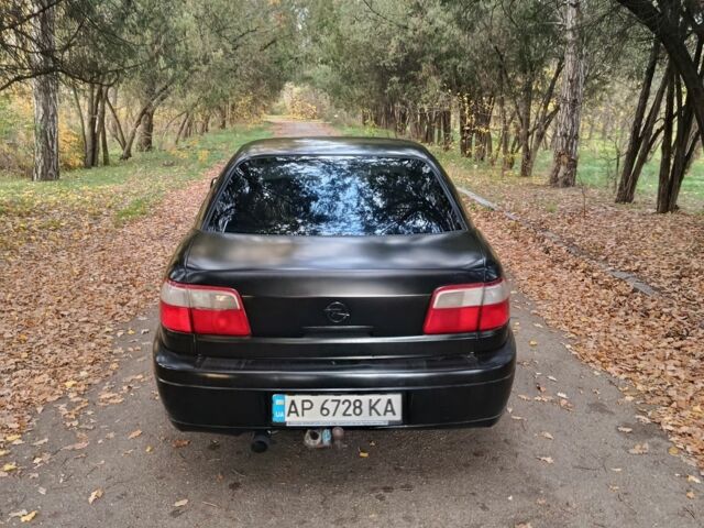 Черный Опель Омега, объемом двигателя 2.6 л и пробегом 350 тыс. км за 3700 $, фото 3 на Automoto.ua