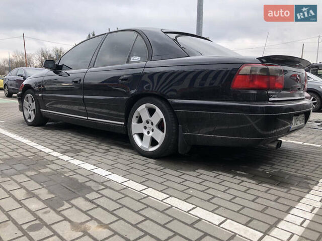 Чорний Опель Омега, об'ємом двигуна 2.2 л та пробігом 335 тис. км за 4000 $, фото 11 на Automoto.ua