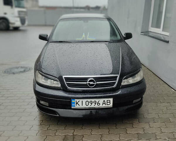 Чорний Опель Омега, об'ємом двигуна 2.2 л та пробігом 335 тис. км за 4000 $, фото 37 на Automoto.ua