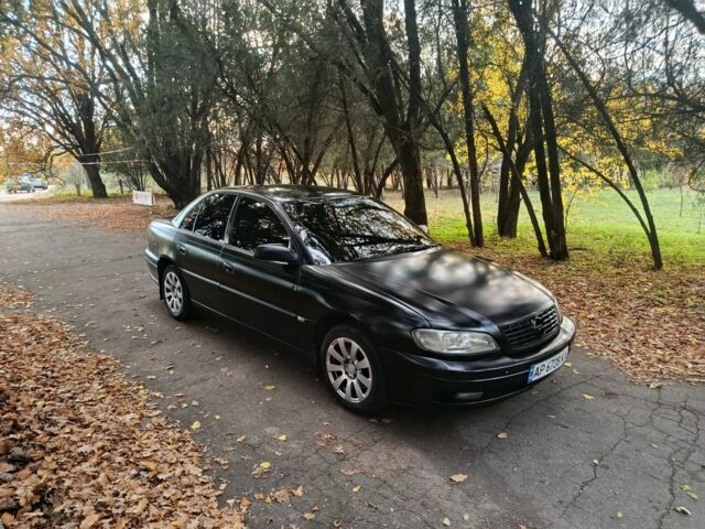 Черный Опель Омега, объемом двигателя 2.6 л и пробегом 350 тыс. км за 3700 $, фото 7 на Automoto.ua