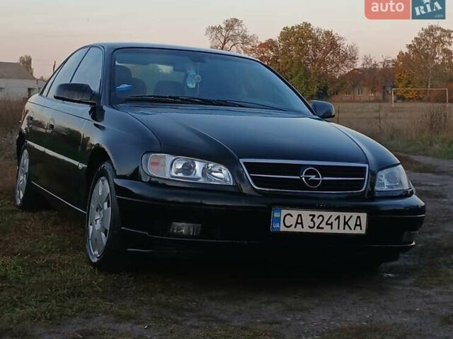Опель Омега 2003 в Черкассах на Automoto.ua Черный Опель Омега, объемом двигателя 2.17 л и пробегом 273 тыс. км за 4200 $, фото 7 на Automoto.ua