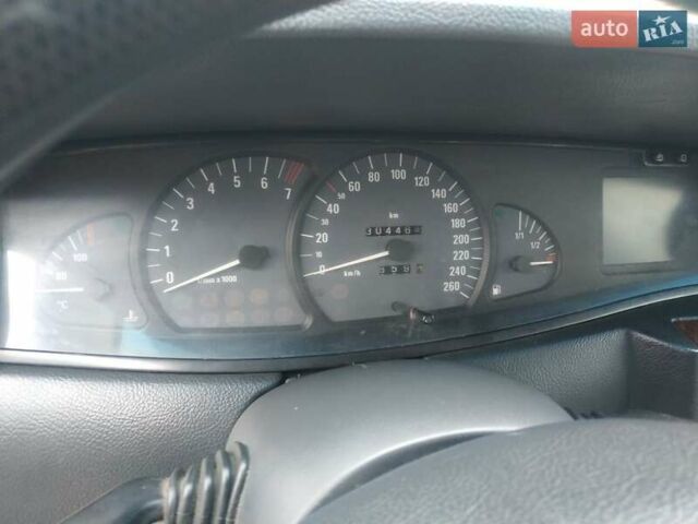 Черный Опель Омега, объемом двигателя 2.6 л и пробегом 300 тыс. км за 3100 $, фото 13 на Automoto.ua