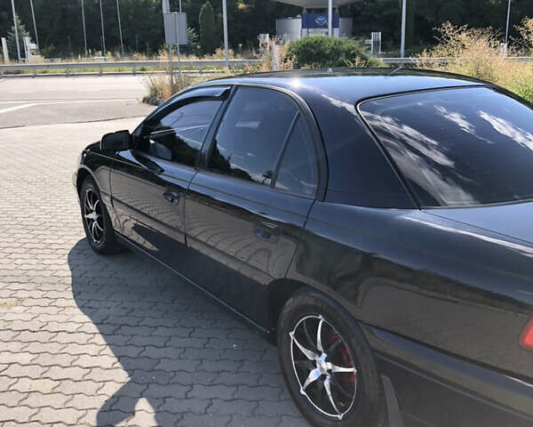 Чорний Опель Омега, об'ємом двигуна 2.2 л та пробігом 467 тис. км за 4000 $, фото 22 на Automoto.ua