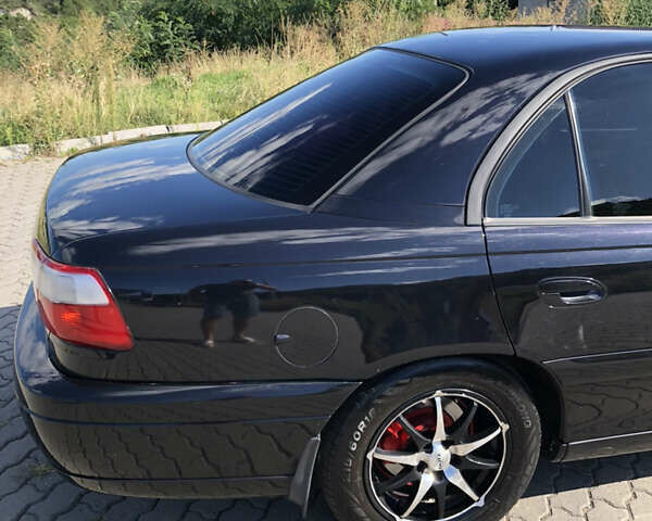 Чорний Опель Омега, об'ємом двигуна 2.2 л та пробігом 467 тис. км за 4000 $, фото 16 на Automoto.ua
